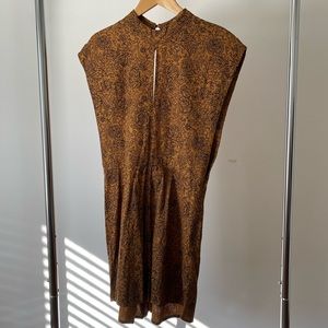 Gold pattern romper